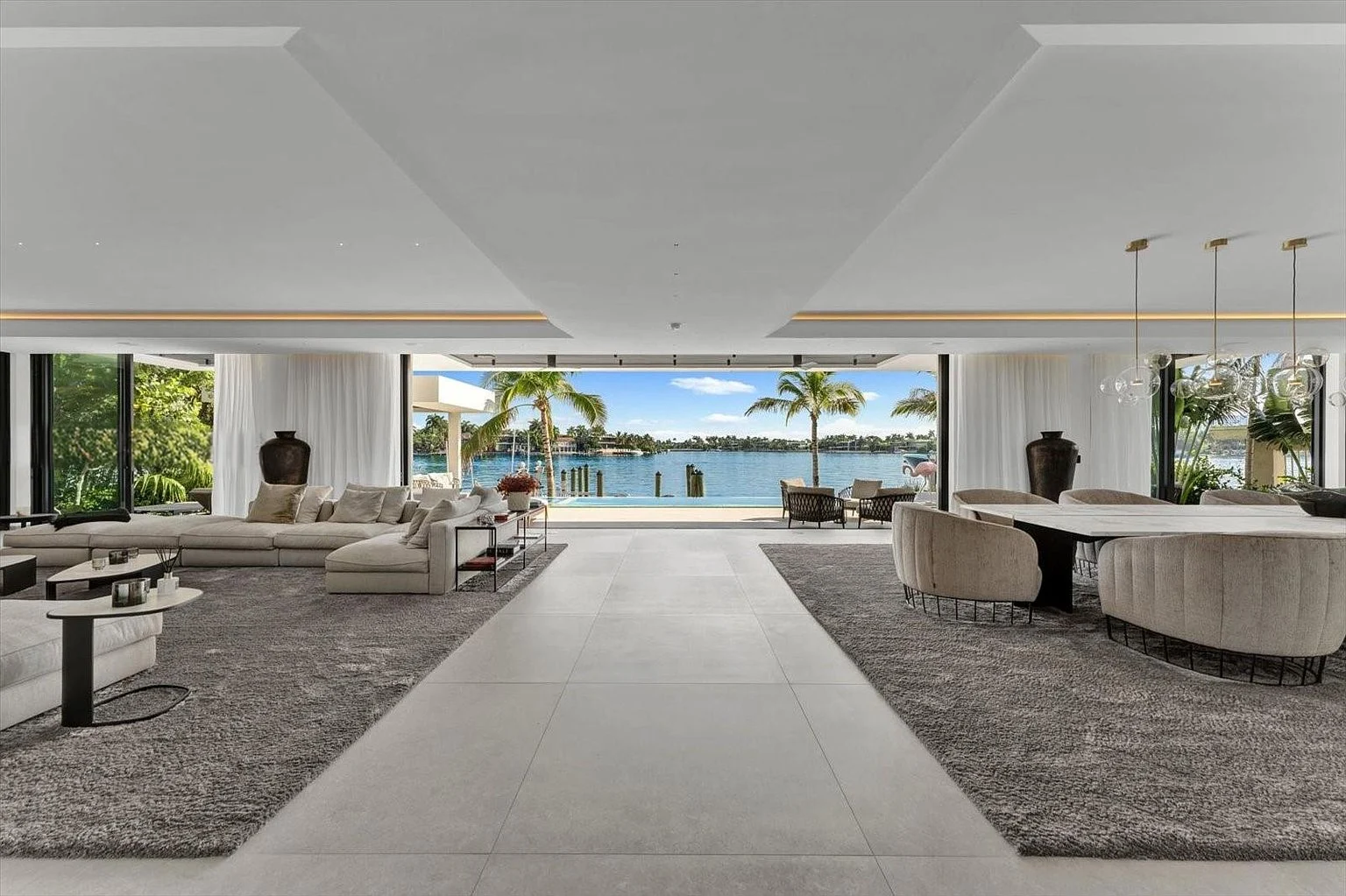 Open living room looking toward the water