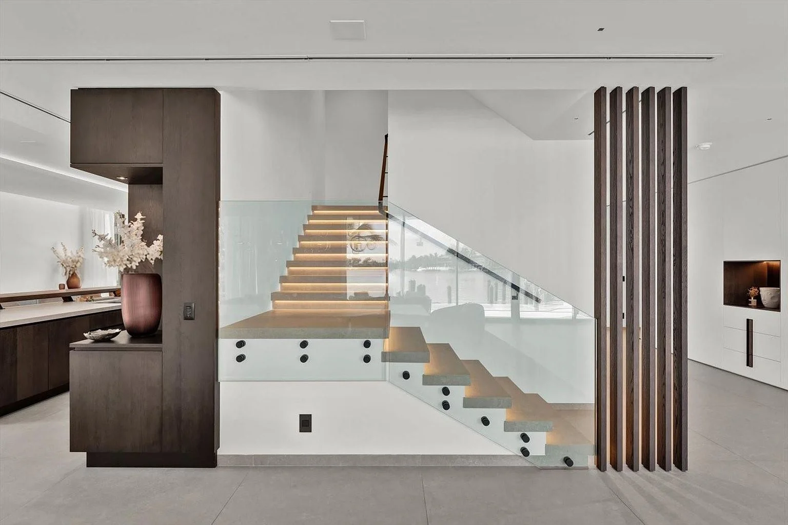 Floating stair treads and glass balustrade